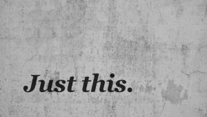 "Just this" text on grey, polished concrete background