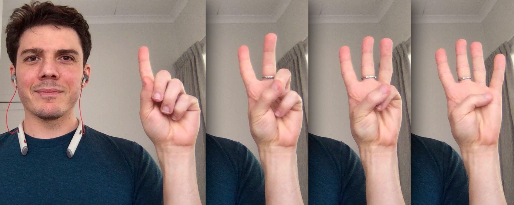 Chris raising one, two, three and four fingers in turn: his place in the stack of people waiting to speak.